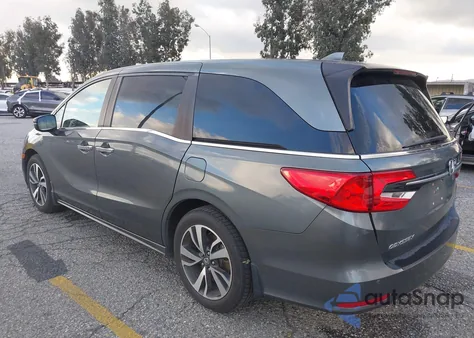 2021 Honda Odyssey Touring z USA, uszkodzony, nr VIN 5FNRL6H86MB011538